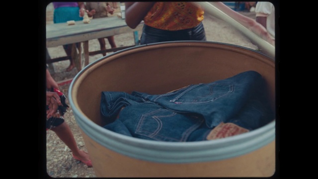 Video Reference: Dishware, Table, Chair, Electric blue, Serveware, Plastic, Shorts, Wood, Automotive wheel system, Bag