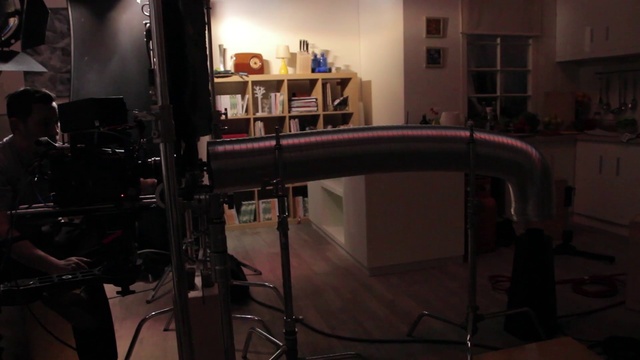 Video Reference: Picture frame, Table, Flooring, Wood, Technology, Machine, Hardwood, Event, Automotive exterior, Shelf