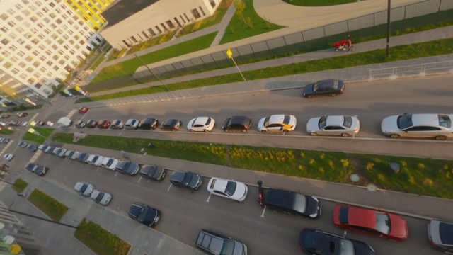 Video Reference: Car, Land vehicle, Vehicle, Tire, Wheel, Motor vehicle, Building, Transport hub, Infrastructure, Asphalt