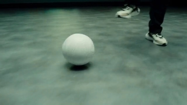 Video Reference: Ball, Indoor games and sports, Sports equipment, Flooring, Wood, Recreation, Event, Monochrome photography, Circle, Human leg