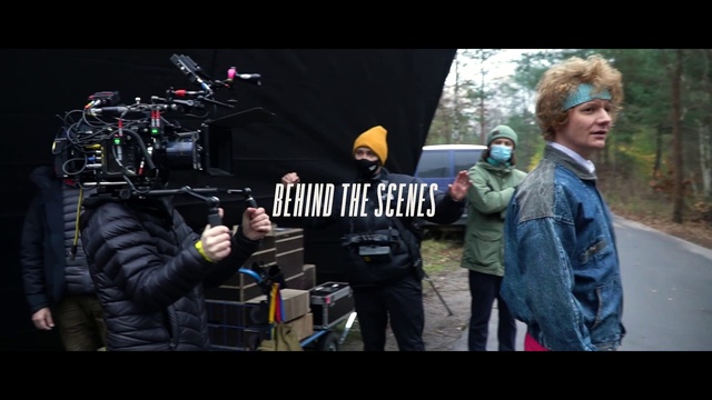 Video Reference: Motor vehicle, Videographer, Plant, Tree, Video camera, Television crew, Cinematographer, Personal protective equipment, Event, Helmet