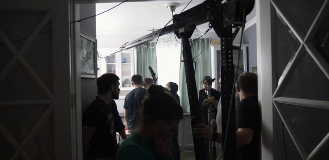 Video Reference: Outerwear, Building, Window, T-shirt, City, Event, Electricity, Fun, Crowd, Room