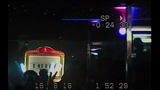 Video Reference: Automotive lighting, Entertainment, Font, Event, Display device, Music venue, Midnight, Sky, Magenta, Signage
