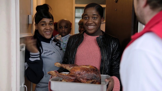 Video Reference: Smile, Food, Cooking, Hat, Event, Pig roast, Cuisine, Meat, Dish, T-shirt