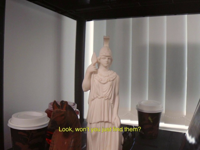 Video Reference: Sculpture, Statue, Wood, Art, Artifact, Font, Visual arts, Room, Carving, Monument
