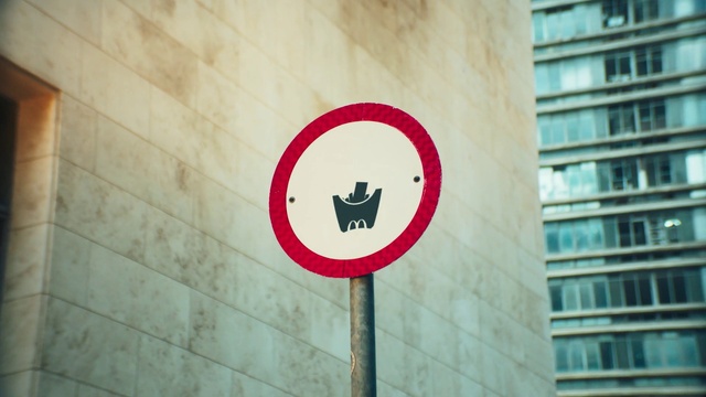 Video Reference: Rectangle, Line, Font, Wall, Tints and shades, Building, Signage, Circle, Logo, Art