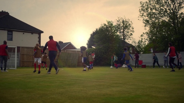 Video Reference: Sky, Cloud, Sports equipment, Plant, Shorts, Tree, Player, Ball, Grass, Ball game