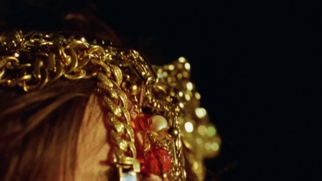 Video Reference: Gold, Jewellery, Christmas decoration, Brass instrument, Event, Christmas ornament, Body jewelry, Metal, Tree, Fashion accessory