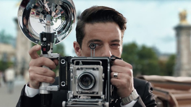 Video Reference: Watch, Photographer, Camera lens, Digital camera, Reflex camera, Flash photography, Camera accessory, Automotive tire, Cameras & optics, Lens