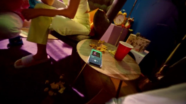 Video Reference: Shorts, Purple, Gadget, Magenta, Fun, Leisure, Thigh, Event, Human leg, Communication Device