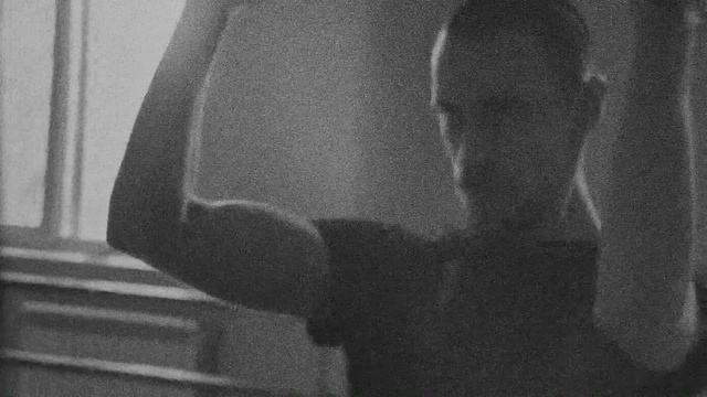 Video Reference: Leg, Jaw, Sleeve, Gesture, Black-and-white, Grey, Style, Waist, Trunk, Chest