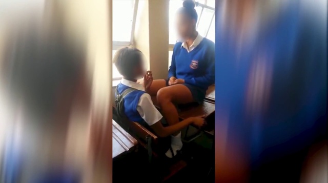 Video Reference: Shorts, Comfort, Knee, Hat, T-shirt, Elbow, Bag, Public transport, Electric blue, Leisure