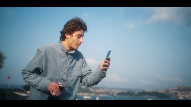 Video Reference: Sky, Cloud, Flash photography, Gesture, Gadget, Communication Device, Happy, Travel, Audio equipment, Display device