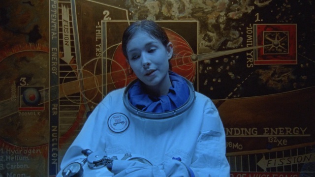 Video Reference: Head, Sleeve, Fashion design, Electric blue, Street fashion, Jewellery, Space, Event, Art, Visual arts