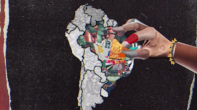 Video Reference: Hand, Gesture, Finger, Asphalt, Art, T-shirt, Toy, Human leg, Wrist, Carmine