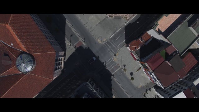 Video Reference: Black, Asphalt, Urban design, Road surface, Landscape, City, Road, Car, Space, Sky