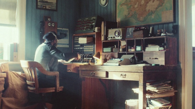 Video Reference: Picture frame, Furniture, Table, Desk, Interior design, Building, Wood, Chair, Shelving, Window