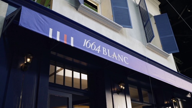 Video Reference: Window, Building, Fixture, Font, Facade, Commercial building, Signage, House, Glass, City