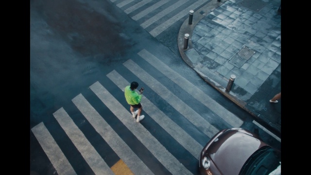Video Reference: Road surface, Asphalt, Urban design, Line, Zebra crossing, Sidewalk, Tints and shades, City, Road, Composite material