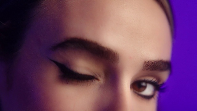 Video Reference: Nose, Cheek, Lip, Eyelash, Flash photography, Jaw, Purple, Iris, Eye liner, Ear