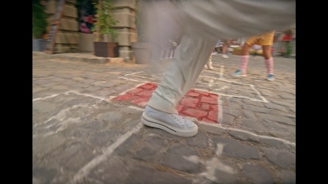 Video Reference: Shoe, Leg, Road surface, Dress, Asphalt, Wood, Flooring, Street fashion, Floor, Thigh