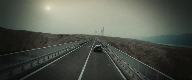 Video Reference: Sky, Car, Cloud, Infrastructure, Road surface, Asphalt, Mode of transport, Atmospheric phenomenon, Tar, Thoroughfare