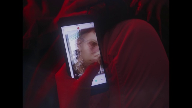 Video Reference: Purple, Font, Magenta, Flash photography, Communication Device, Display device, Electronic device, Technology, Gadget, T-shirt