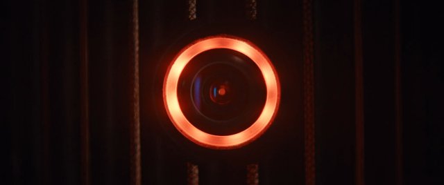 Video Reference: camera, lens, close-up, red light, glowing, technology, optics, dark background, equipment, macro, abstract, device