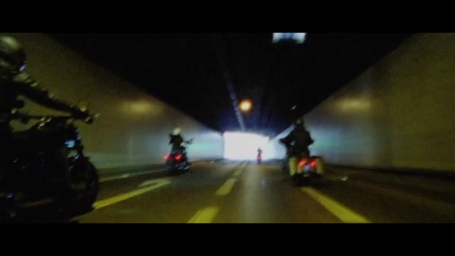 Video Reference: Tire, Automotive lighting, Vehicle, Wheel, Asphalt, Road surface, Motor vehicle, Sky, Motorcycle, Headlamp