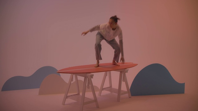 Video Reference: Table, Knee, Wood, Flooring, Performing arts, Entertainment, Balance, Art, Event, Recreation