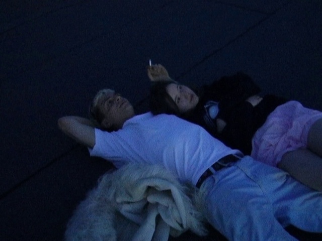 Video Reference: Comfort, Gesture, Electric blue, Human leg, Elbow, Knee, Darkness, Leisure, Sitting, Foot