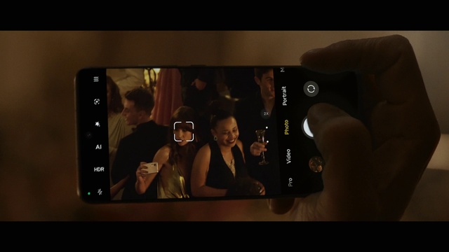 Video Reference: Brown, Communication Device, Gesture, Mobile phone, Gadget, Portable communications device, Mobile device, Telephony, Font, Flash photography