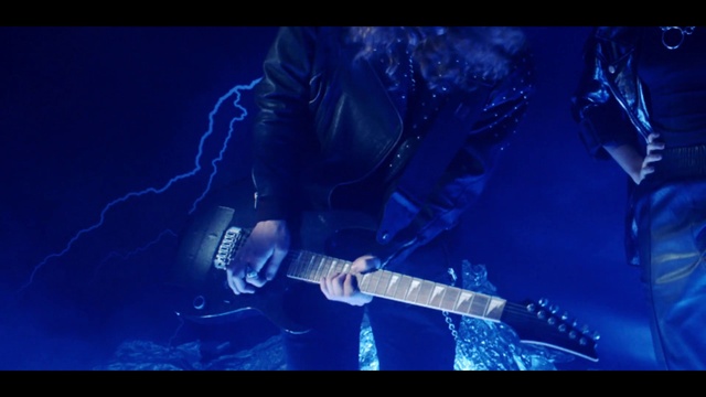 Video Reference: Guitar, Musical instrument, Blue, Guitar accessory, Musician, String instrument, Purple, String instrument accessory, Organism, Concert