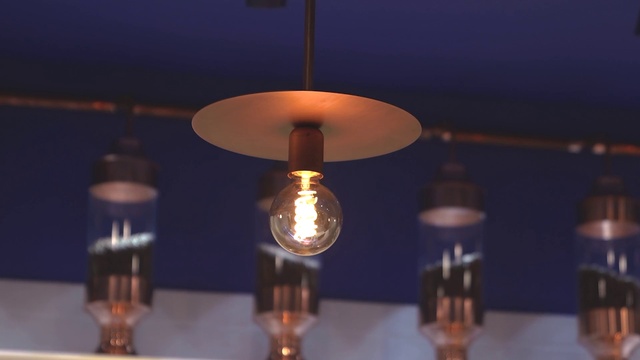 Video Reference: Light, Amber, Lamp, Facial hair, Gas, Tints and shades, Electricity, Light bulb, Ceiling fixture, Glass