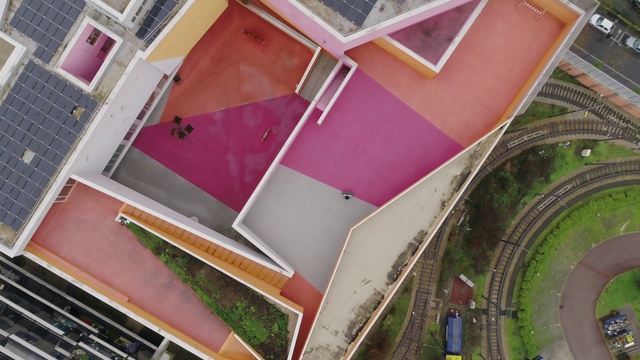 Video Reference: Building, Property, Green, Urban design, Pink, Condominium, Wood, Residential area, Tower block, Material property