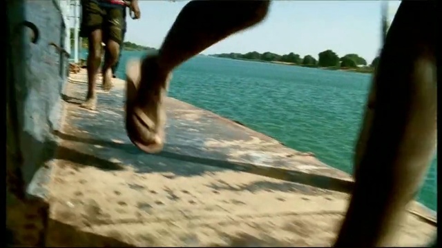Video Reference: Sky, Water, Leg, People in nature, Wood, Knee, Sneakers, Thigh, Grass, Tints and shades