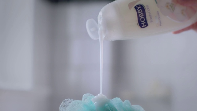 Video Reference: White, Liquid, Drinkware, Petal, Font, Toy, Electric blue, Glass, Macro photography, Logo