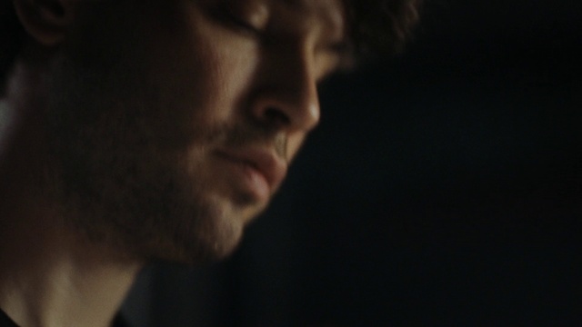 Video Reference: Nose, Eyelash, Flash photography, Jaw, Gesture, Midnight, Darkness, Event, Facial hair, Smoke