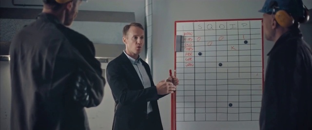 Video Reference: Whiteboard, Gesture, Blazer, Suit, Handwriting, Event, Font, Job, White-collar worker, Formal wear