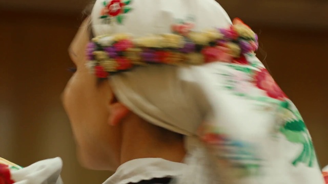 Video Reference: Sleeve, Eyelash, Fashion design, Happy, Event, Fashion accessory, Human leg, Headpiece, Tradition, Visual arts