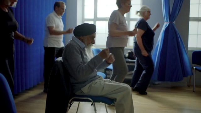 Video Reference: Joint, Trousers, Blue, Window, Gesture, Comfort, Curtain, Chair, Event, Service