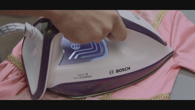 Video Reference: Pink, Sportswear, Material property, Waist, Font, Thigh, Audio equipment, Magenta, Personal protective equipment, Human leg