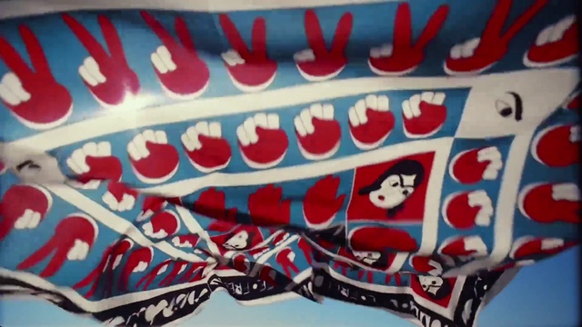 Video Reference: Font, Automotive exterior, Rectangle, Electric blue, Pattern, Art, Bumper, Event, Advertising, Carmine