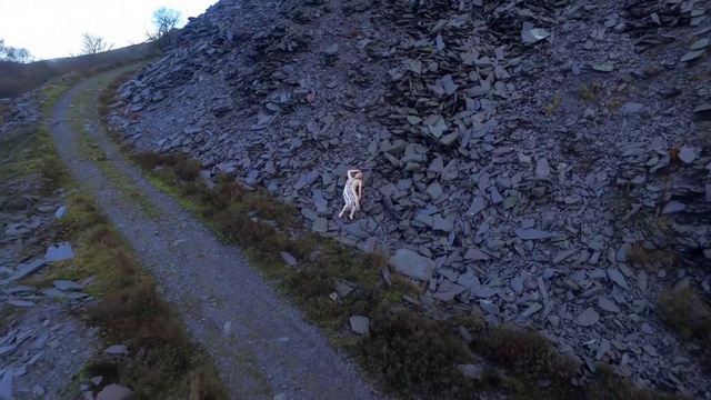 Video Reference: Plant, Slope, Bedrock, Grass, Asphalt, Road surface, Geological phenomenon, Groundcover, Tree, Landscape