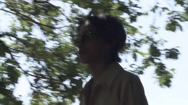 Video Reference: People in nature, Sky, Trunk, Wood, Happy, Eyewear, Grass, Black hair, Tree, Tints and shades