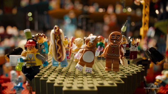Video Reference: LEGO, minifigures, toy, costumes, fantasy, group, baseplate, indoor, colorful, blurred background, playset, character figures, scene, animation, collectibles