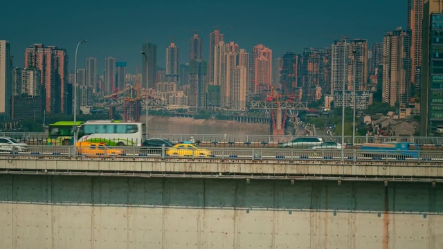 Video Reference: Skyscraper, Building, Vehicle, Sky, Bus, Infrastructure, Tower, Tower block, Line, Cityscape