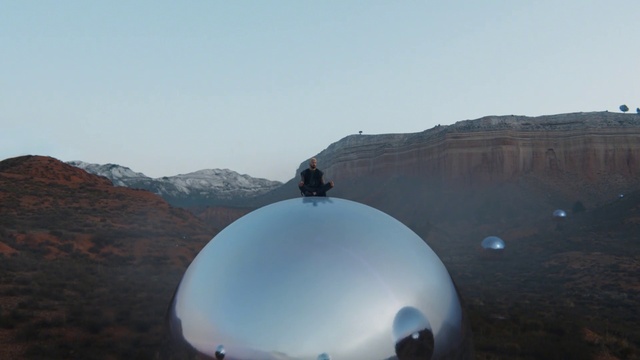 Video Reference: Sky, Mountain, Tree, Helmet, Slope, Landscape, Recreation, Dome, Mountain range, Travel