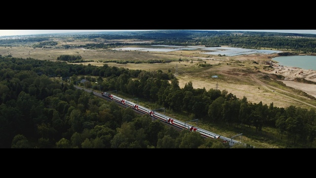 Video Reference: Water, Train, Plant, Tree, Land lot, Natural landscape, Highland, Vehicle, Slope, Terrain