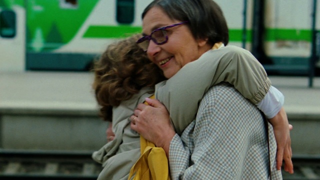 Video Reference: Glasses, Smile, Vision care, Gesture, Yellow, Eyewear, Happy, Travel, Event, Leisure